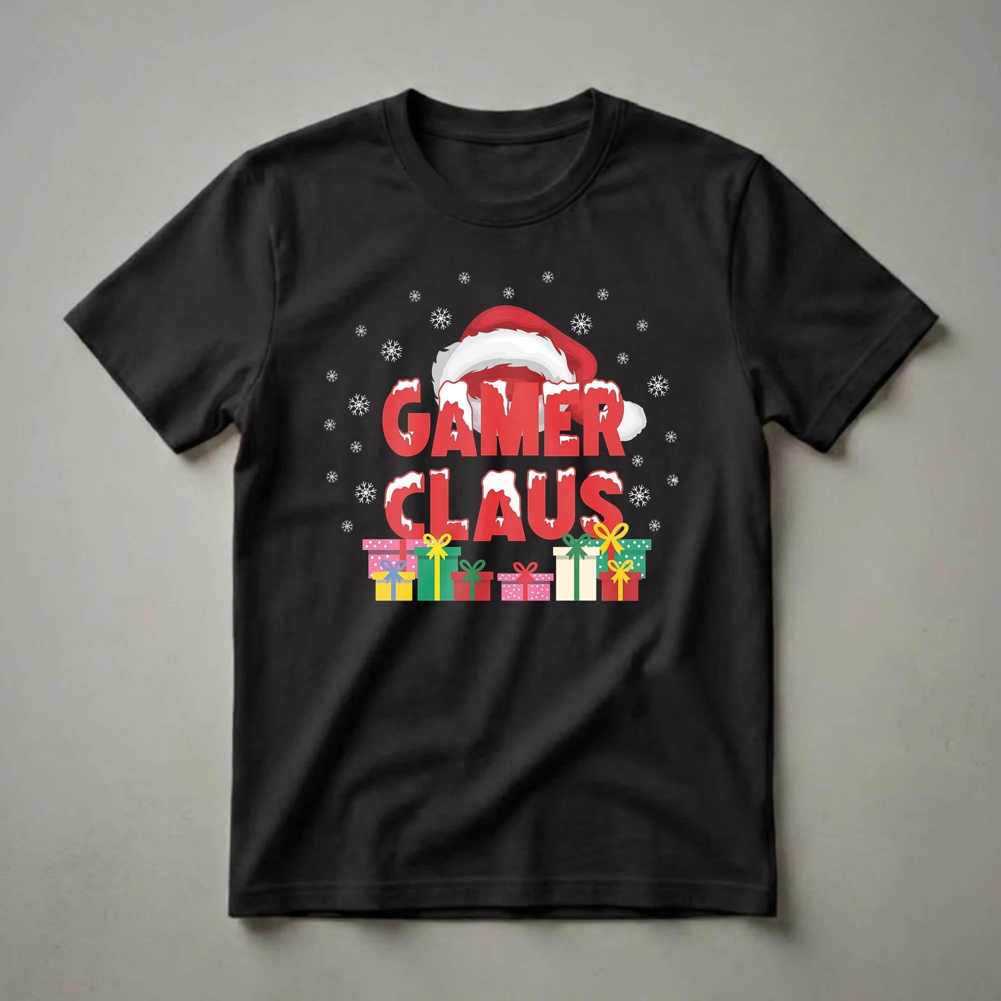 Black t-shirt with red 'GAMER CLAUS' text, a Santa hat, snowflakes, and colorful gift boxes.