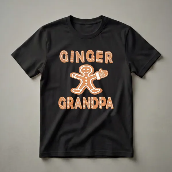 Black t-shirt featuring a gingerbread man graphic with the words 'Ginger Grandpa' in gingerbread-style lettering, decorated with white icing.