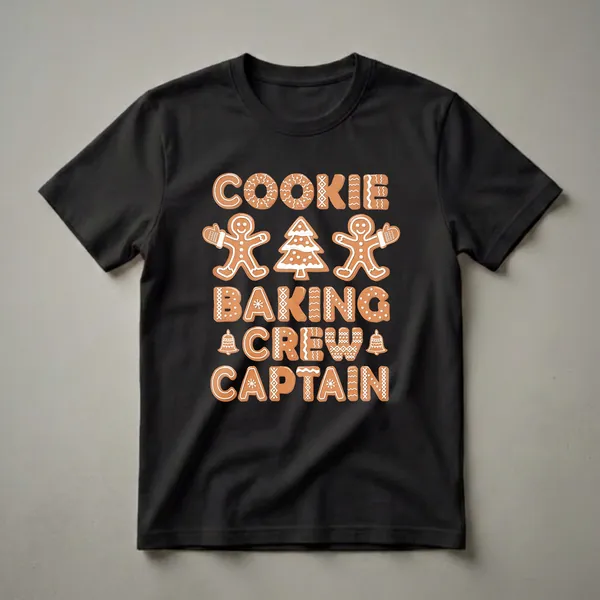 Black t-shirt with gingerbread letters spelling 'COOKIE BAKING CREW CAPTAIN', featuring gingerbread men and a Christmas tree.