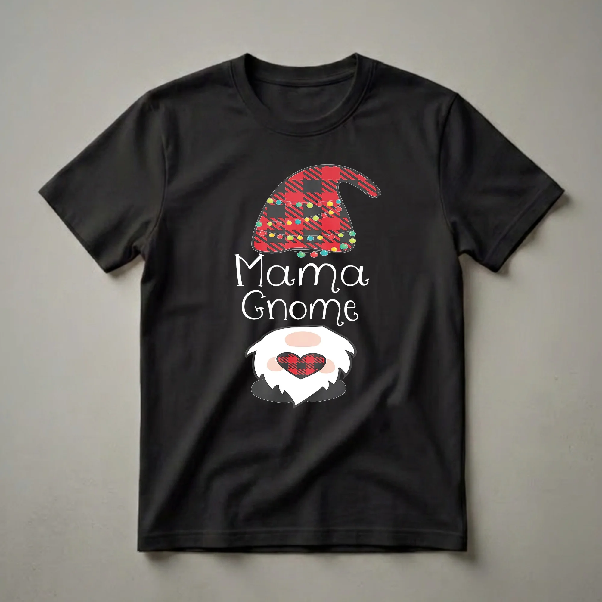 Black t-shirt featuring a "Mama Gnome" graphic with a red and black buffalo plaid hat decorated with colorful Christmas lights and a matching plaid heart.