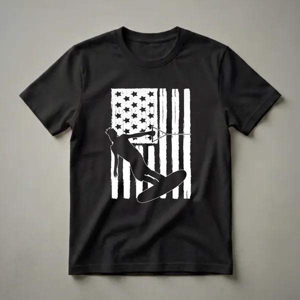 Black silhouette of a wakeboarder performing a trick against a distressed white and black American flag graphic on a black t-shirt.