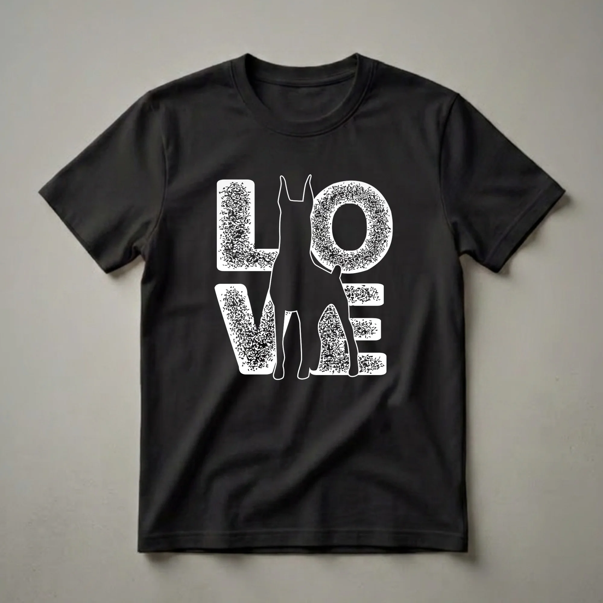 Black graphic t-shirt featuring the word LOVE with a white silhouette of a Doberman Pinscher in place of the letter O. The letters have a distressed texture.