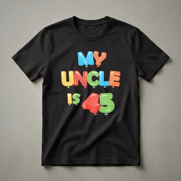 Black t-shirt with colorful balloon letters spelling 'MY UNCLE IS 45' and attached strings.