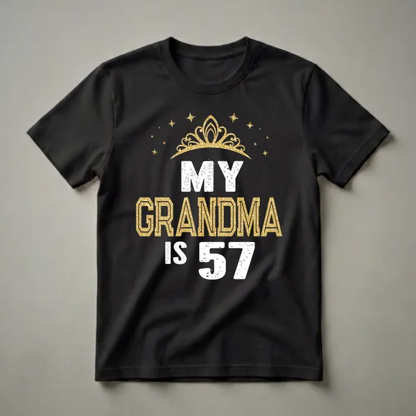 Black t-shirt with white distressed text 'MY' and 'IS 57', and gold glitter text 'GRANDMA', topped with a golden crown and surrounded by gold stars.