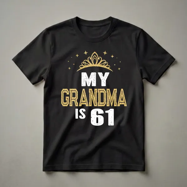 Black t-shirt with white and gold text that reads 'MY GRANDMA IS 61', topped with a golden crown and surrounded by golden stars.