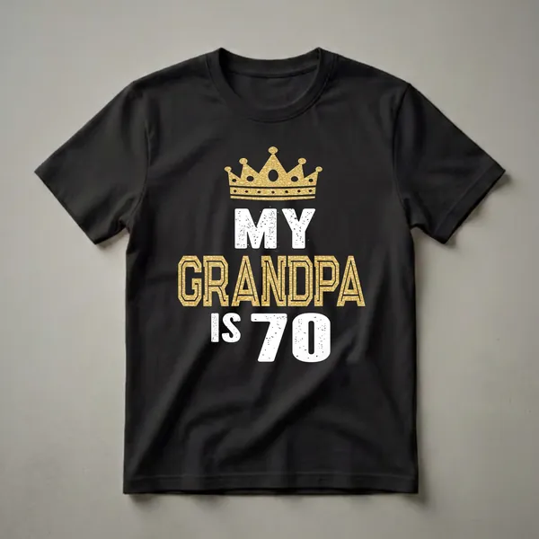 Black t-shirt with a golden crown graphic and white and gold text that reads 'MY GRANDPA IS 70'.
