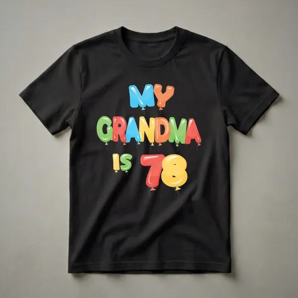 Black t-shirt with colorful balloon letters spelling 'My Grandma is 78' and balloon numbers '78'.