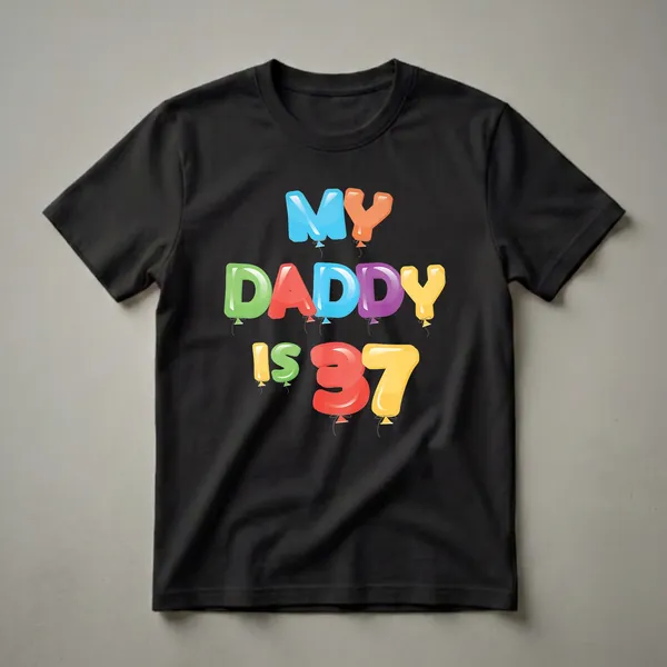 Black t-shirt with colorful balloon letters that spell out 'MY DADDY IS 37', with strings attached to each letter.