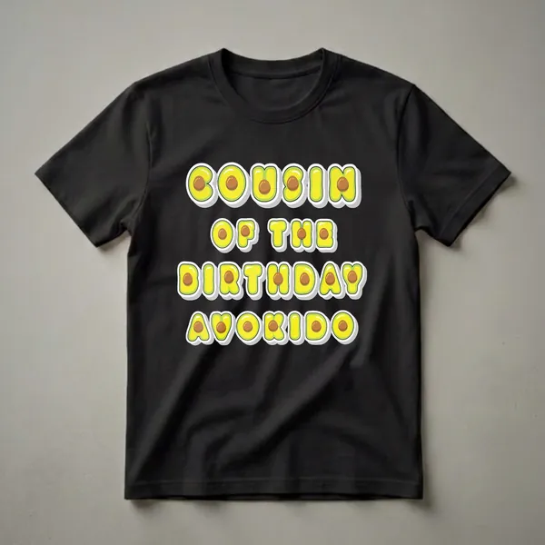 Black t-shirt with the words 'Cousin Of The Birthday Avokido' written in large, bubbly letters designed to look like sliced avocados with pits.