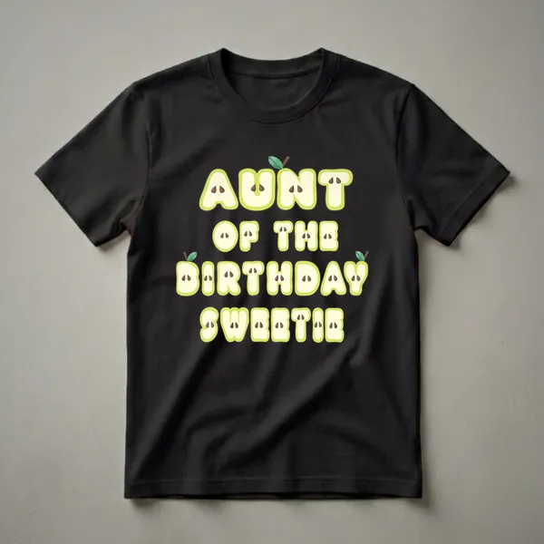 Black t-shirt with the words Aunt Of The Birthday Sweetie in light green, fruit-slice-themed letters with brown seeds and green stems.