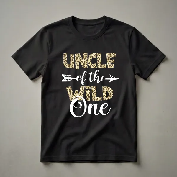 Black t-shirt with white text and leopard print fill that reads "UNCLE of the WILD ONE" with a white arrow graphic.