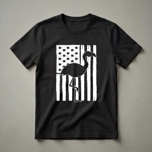 Black silhouette of a flamingo standing in front of a distressed white and black American flag, printed on a black t-shirt.