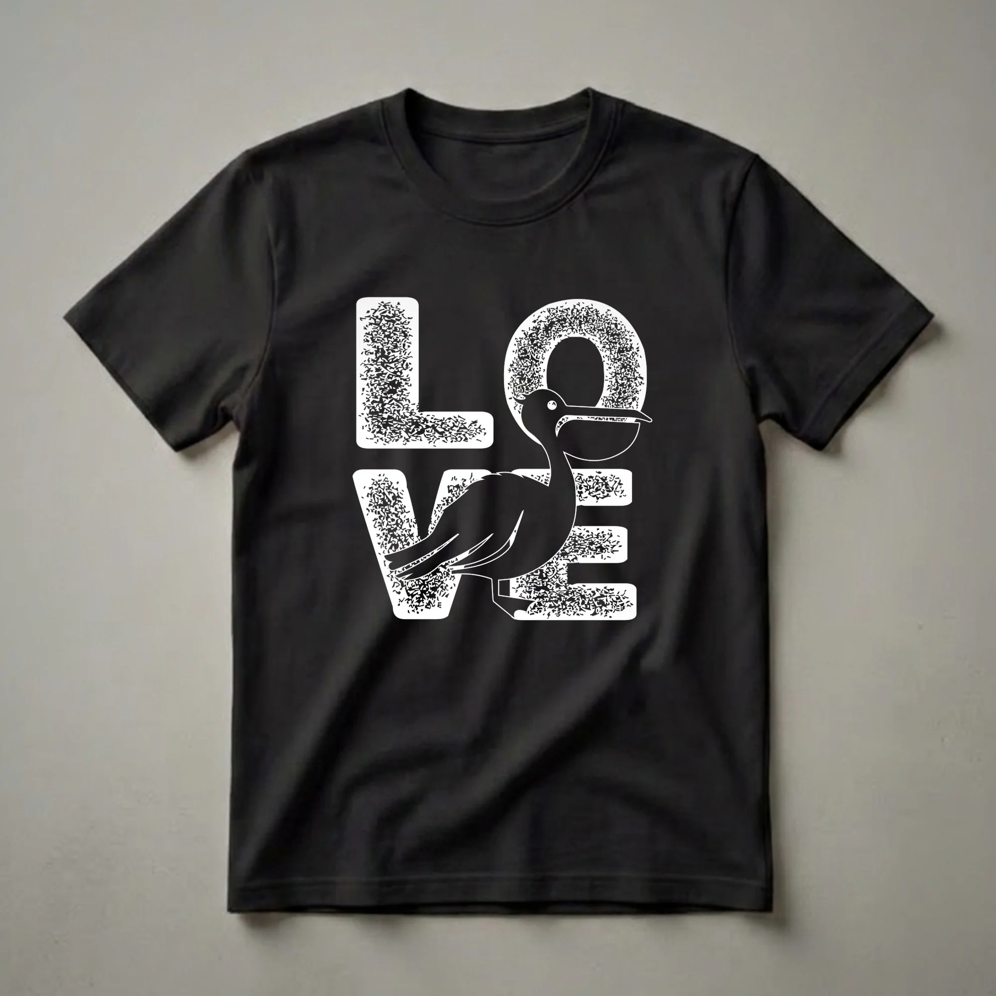 Black t-shirt with white graphic text 'LOVE' and a pelican silhouette replacing the letter 'O', featuring a speckled texture.
