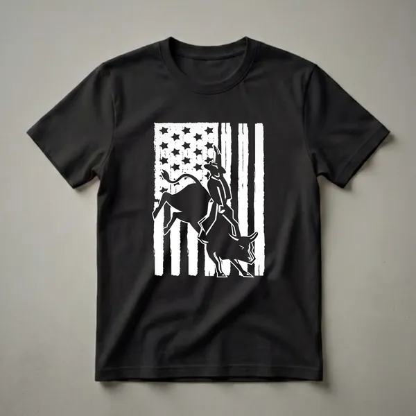 Black graphic t-shirt featuring a white silhouette of a cowboy riding a bucking bull against a distressed American flag with stars and stripes.