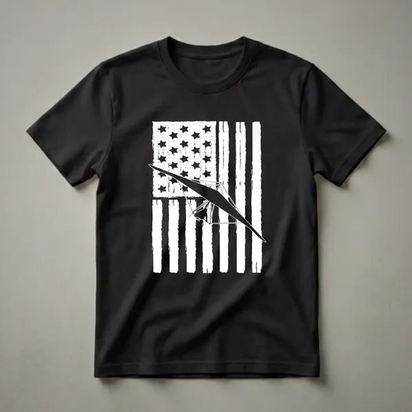 Black graphic t-shirt featuring a hang glider pilot silhouette against a distressed American flag with stars and stripes.