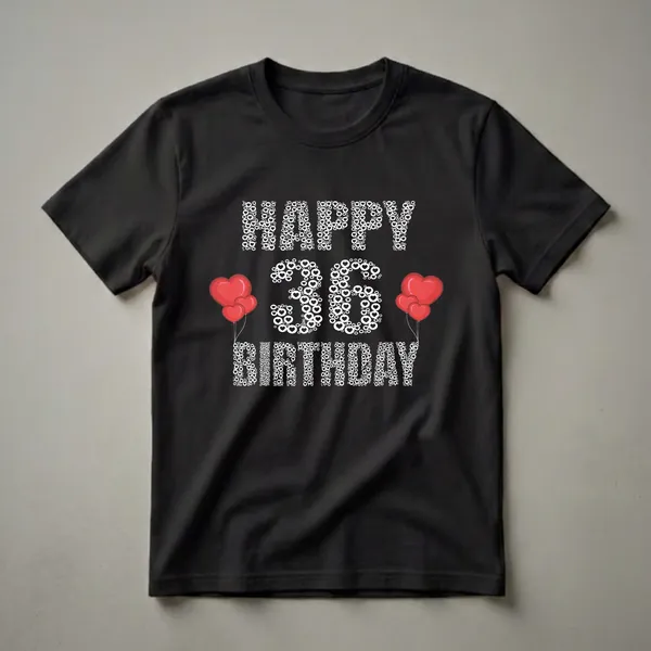 Black t-shirt with white text graphic that reads 'HAPPY 36 BIRTHDAY' composed of hearts and circles, with red heart balloons on either side of the number 36.