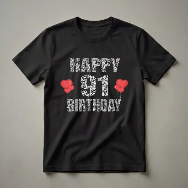 Black t-shirt with white text graphic that reads 'Happy 91st Birthday' formed by hearts and circles, with red heart balloons on the left and right sides.