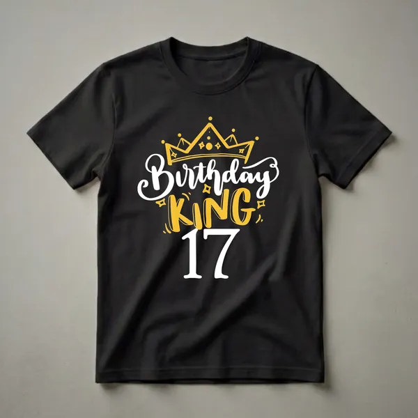 Black t-shirt with a graphic design featuring a golden crown, the words 'Birthday KING' in white and yellow, and the number '17' in white.