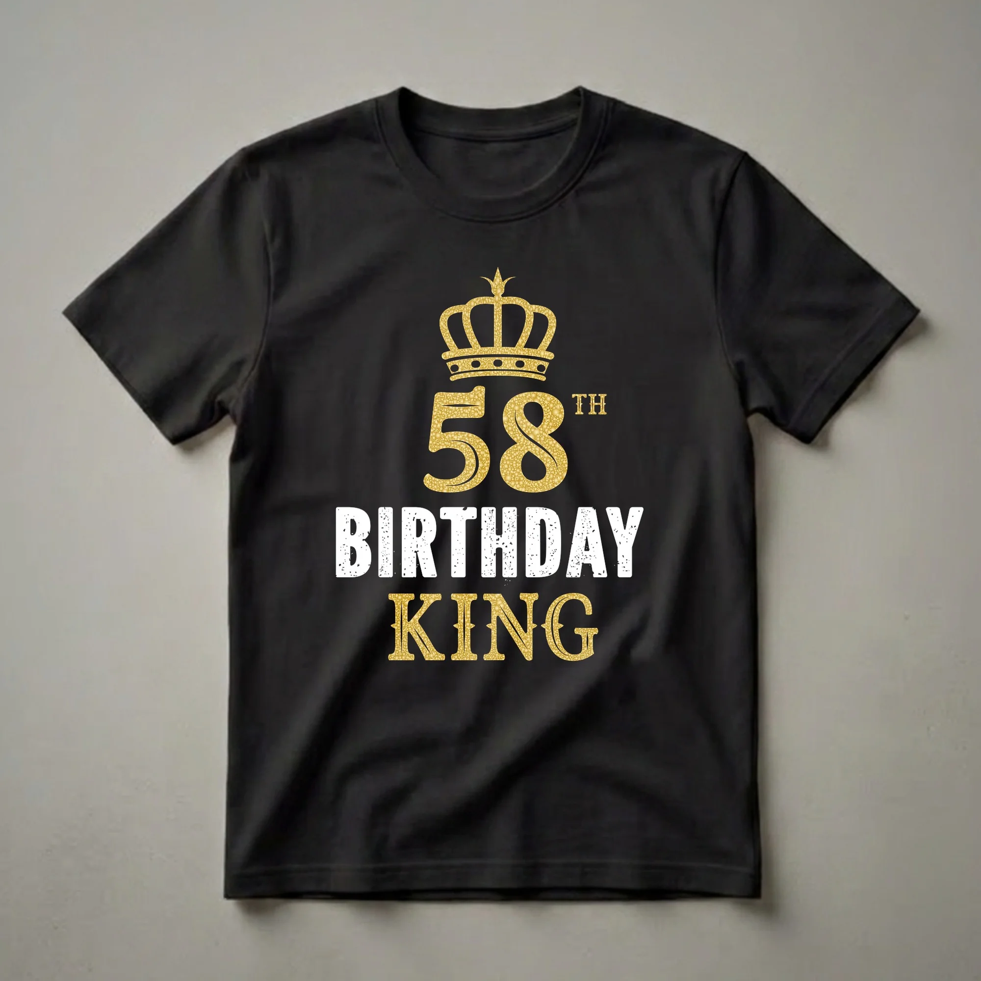 Black t-shirt with a golden crown graphic above the number 58 and the text '58th BIRTHDAY KING' in distressed white and gold.