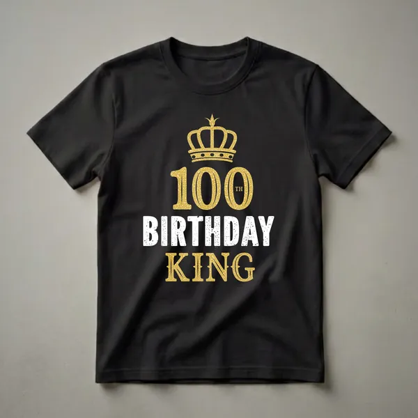 Black t-shirt with a gold crown graphic above the number '100' and the text 'TH BIRTHDAY KING' in distressed white and gold.