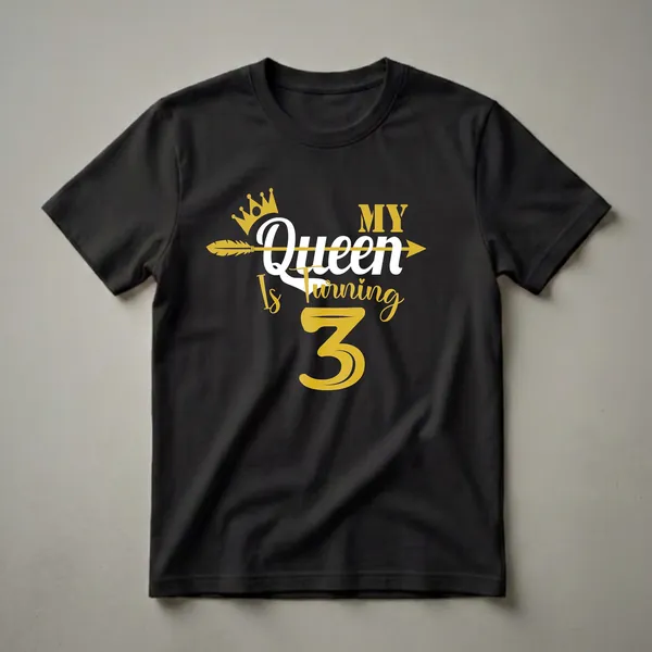 Black t-shirt with gold and white text that reads 'My Queen Is Turning 3', featuring a gold crown and a gold arrow.