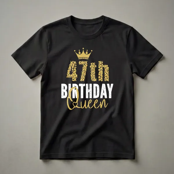Black t-shirt with a gold crown and the text '47th BIRTHDAY Queen' in distressed white and gold glittery circles, celebrating a 47th birthday.