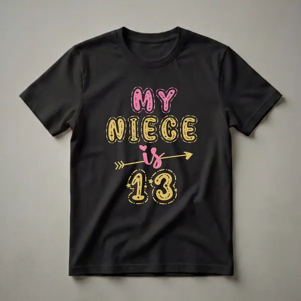 Black t-shirt with pink and gold glitter text that reads 'MY NIECE is 13', with stars and an arrow graphic.