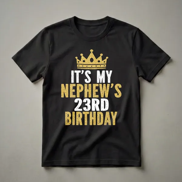Black t-shirt with a gold glitter crown graphic above distressed white and gold text that reads 'IT'S MY NEPHEW'S 23RD BIRTHDAY'.