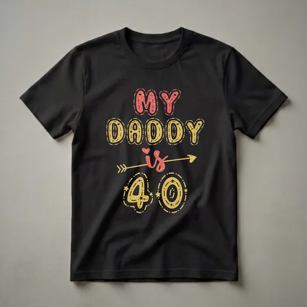 Black t-shirt with 'MY DADDY is 40' graphic in red and gold glitter effect lettering, featuring an arrow and decorative stars and dots.