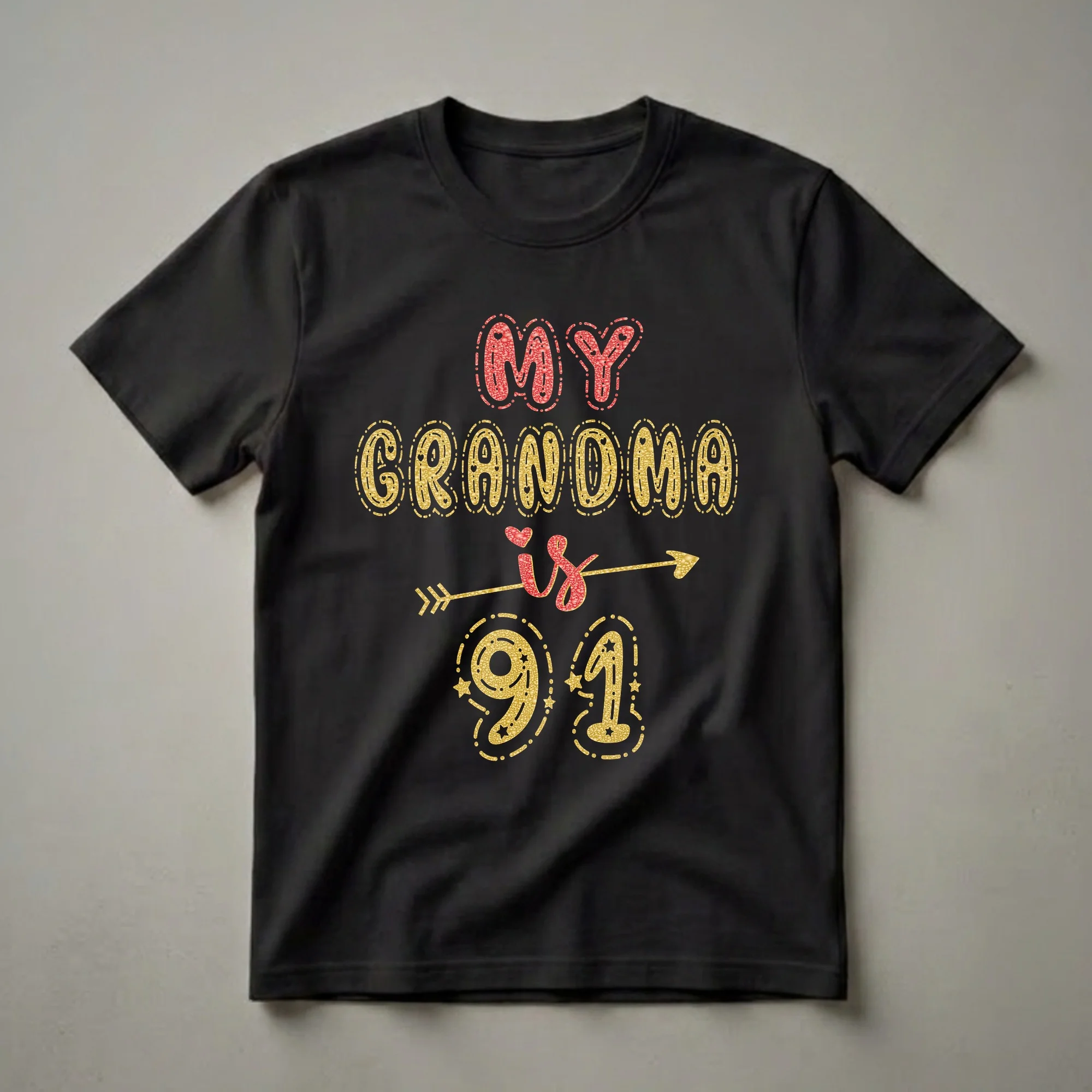 Black t-shirt with glitter graphic text that reads 'MY GRANDMA is 91' in red and gold.