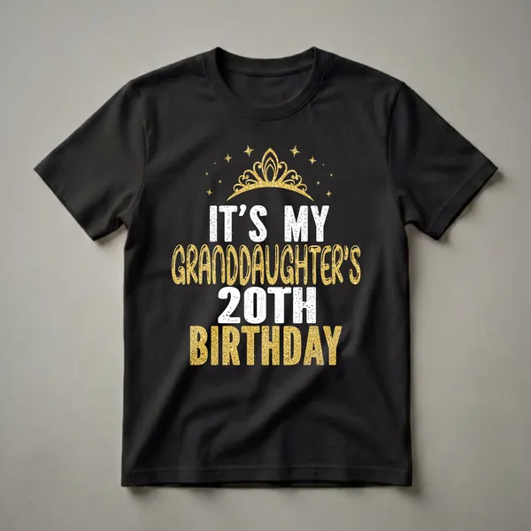 Black t-shirt with white and gold text that reads 'IT'S MY GRANDDAUGHTER'S 20TH BIRTHDAY', topped with a golden crown and scattered gold stars.