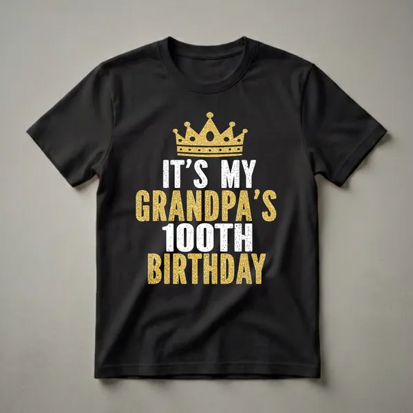 Black t-shirt with a gold glitter crown and distressed white and gold text that reads 'IT'S MY GRANDPA'S 100TH BIRTHDAY'.