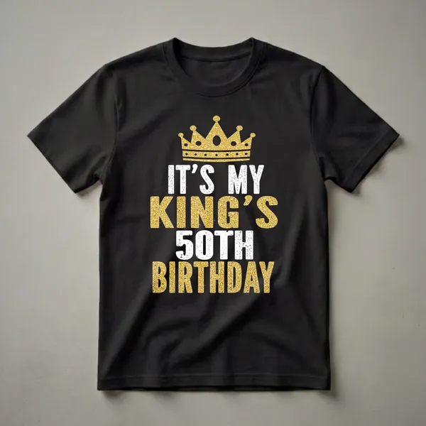 Black t-shirt with a golden crown graphic and distressed white and gold text reading 'IT'S MY KING'S 50TH BIRTHDAY'.