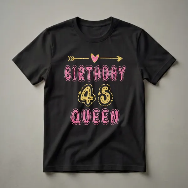 Black t-shirt featuring pink glitter 'BIRTHDAY' and 'QUEEN' text with gold glitter '45' numbers, stars, and decorative arrows.