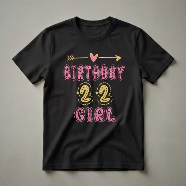 Black t-shirt with "Birthday 22 Girl" text in glittery pink and gold, with decorative arrows and heart.