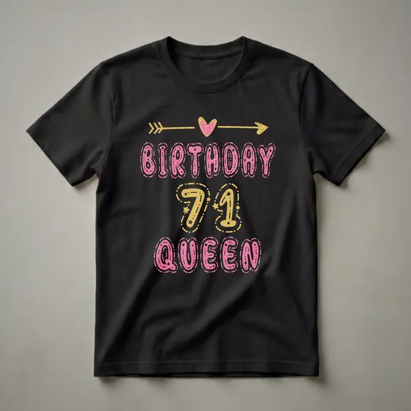Black t-shirt with 'BIRTHDAY 71 QUEEN' text in glittery pink and gold, with decorative arrows and a heart.