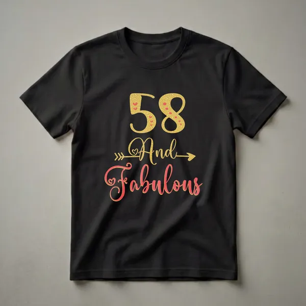 Black t-shirt with gold glitter '58' and coral red 'Fabulous' text, accented with hearts and arrows.