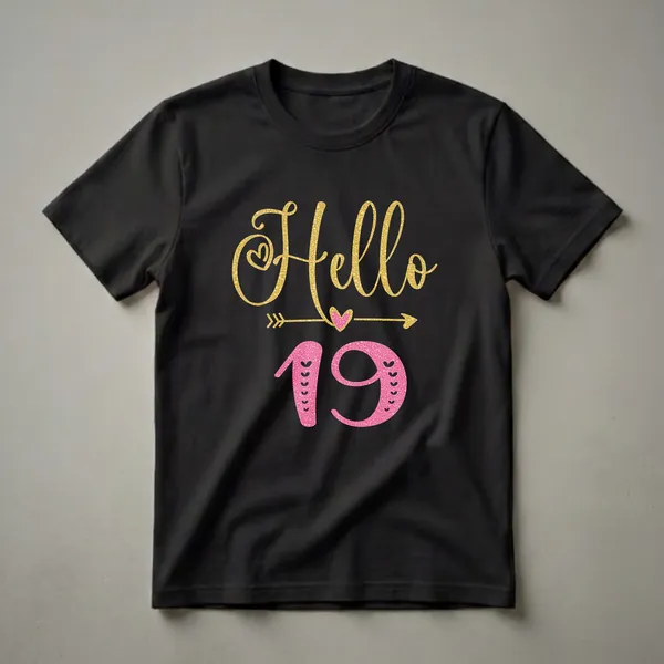 Black t-shirt with gold glitter text 'Hello' and pink textured number '19', accented with hearts and arrows, for a 19th birthday celebration.
