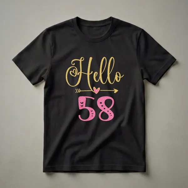 Black t-shirt featuring the text 'Hello 58' in gold and pink glitter with heart and arrow graphics.