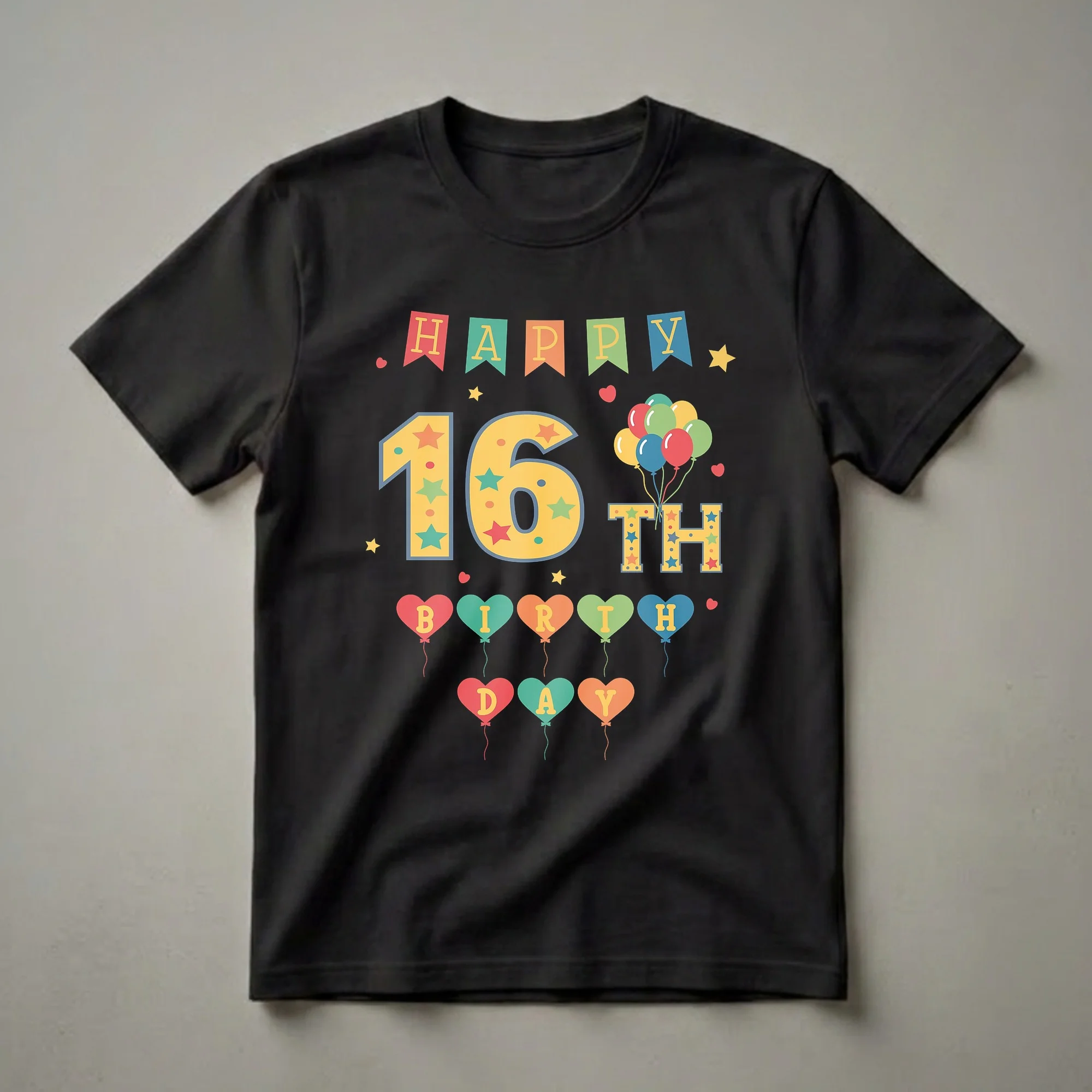 A black t-shirt featuring a colorful 'Happy 16th Birthday' graphic with banners, balloons, and heart-shaped balloons spelling out 'BIRTHDAY'.