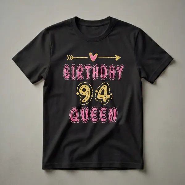 Black t-shirt featuring pink glittery text that reads 'BIRTHDAY QUEEN' and gold glittery numbers '94', with decorative arrows and a heart.