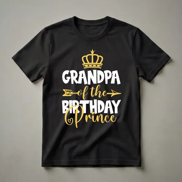 Black t-shirt with white and yellow text that reads 'Grandpa of The Birthday Prince', featuring a yellow crown and arrow graphic.