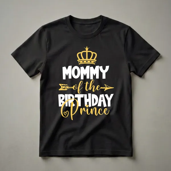 Black t-shirt with white and gold text that reads 'Mommy of The Birthday Prince' and features a golden crown and arrow graphic.