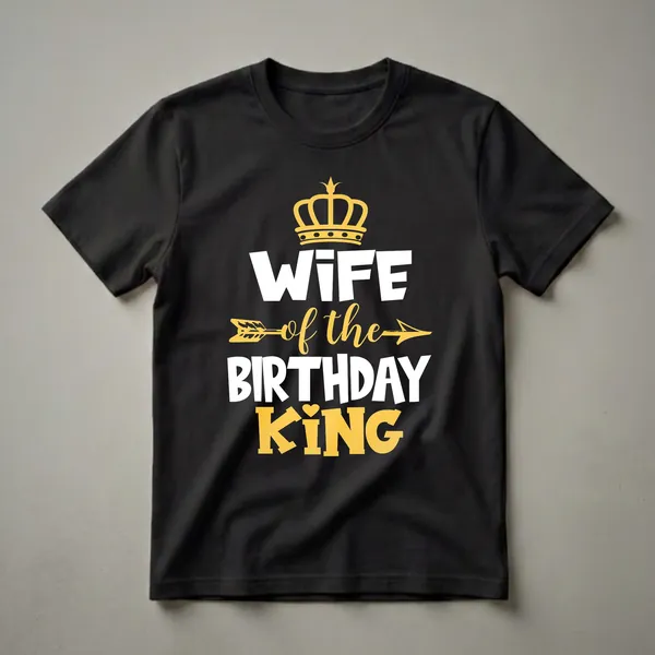 Black t-shirt with white and yellow text that reads 'WIFE of the BIRTHDAY KING', featuring a gold crown and arrow graphic.
