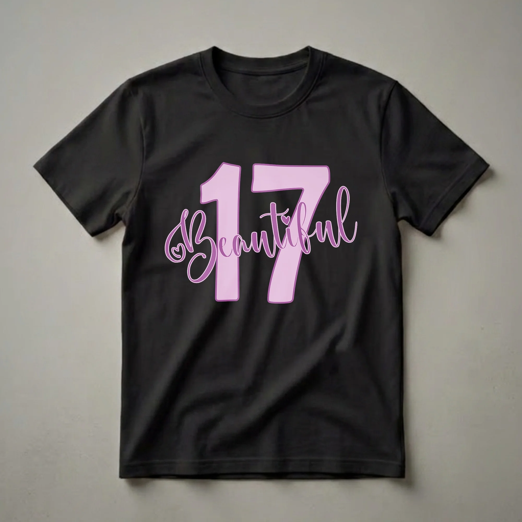 Light pink and purple graphic t-shirt with the number 17 and the word 'Beautiful' in a script font, celebrating a 17th birthday.