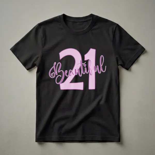 Light pink graphic t-shirt with the number 21 and the word 'Beautiful' in purple script font, featuring a small heart detail.