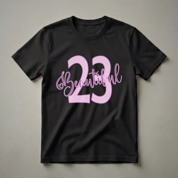 Lilac and purple graphic t-shirt design featuring the number 23 and the word 'Beautiful' in script font with a small heart.