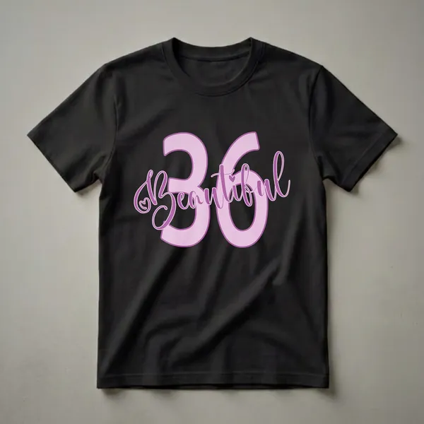 Light purple graphic t-shirt with the number 36 and the word 'Beautiful' in darker purple script, featuring a small heart detail.