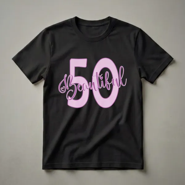A graphic t-shirt design featuring the number 50 in large pink font with a purple outline, and the word 'Beautiful' in a purple script font with a heart detail.