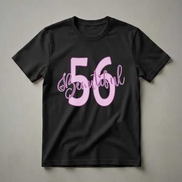 Light pink graphic tee with the number 56 and the word 'Beautiful' in a purple script font, celebrating a 56th birthday.